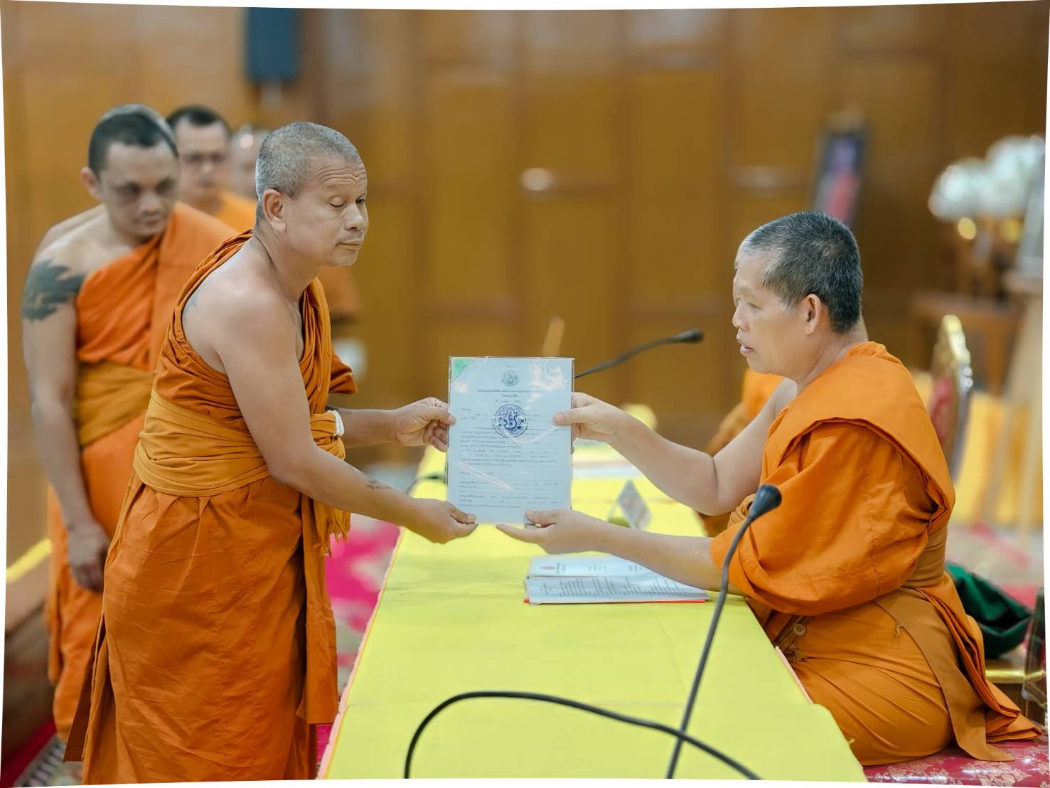 title - วันเสาร์ที่ 25 กรกฎาคม 2569 นายประเสริฐ กาญจนเกียรติกุล ปฏิรูปที่ดินจังหวัดบุรีรัมย์ พร้อมด้วยเจ้าหน้าที่ ส.ป.ก.บุรีรัมย์ มอบหนังสืออนุญาตให้ใช้ที่ดินเพื่อกิจการสาธารณูปโภค กรณีสำนักงานพระพุทธศาสนาแห่งชาติขอใช้ที่ดินเพื่อสร้างวัดจำนวน 7 วัด ในการประชุมคณะสงฆ์จังหวัดบุรีรัมย์ สมัยสามัญ ครั้งที่ 5 ปี 2569 ณ วัดกลาง พระอารามหลวง อำเภอเมืองบุรีรัมย์ จังหวัดบุรีรัมย์